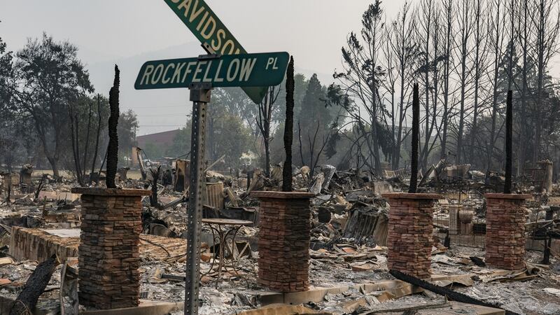 The ashes  of homes in a neighuborhood destroyed in the Almeda Fire in September 2020 in Talent, Oregon. Photograph Nathan Howard/Getty Images