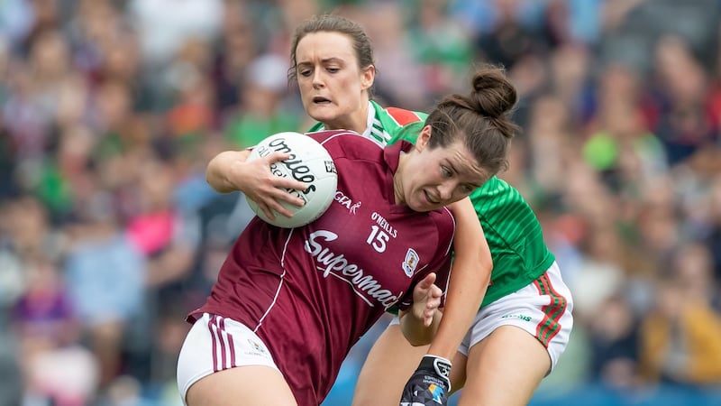 Galway’s Róisín Leonard  gets past Mayo’s Ciara McManamon in the semi-final. Photograph: Inpho/Morgan Treacy