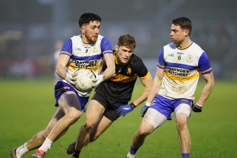 Joe Oguz of Errigal Ciarán travels during the game against Dr Crokes in the club championship semi-final earlier this month. Photograph: James Lawlor/Inpho 