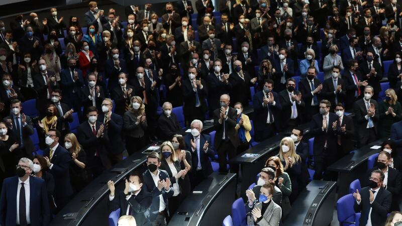 Members of the Bundestag give a standing ovation to the Ukranian ambassador to Germany, Andrij Melnyk,  before the speech by chancellor Olaf Scholz on Sunday. Photograph: Hannibal Hanschke/Getty Images