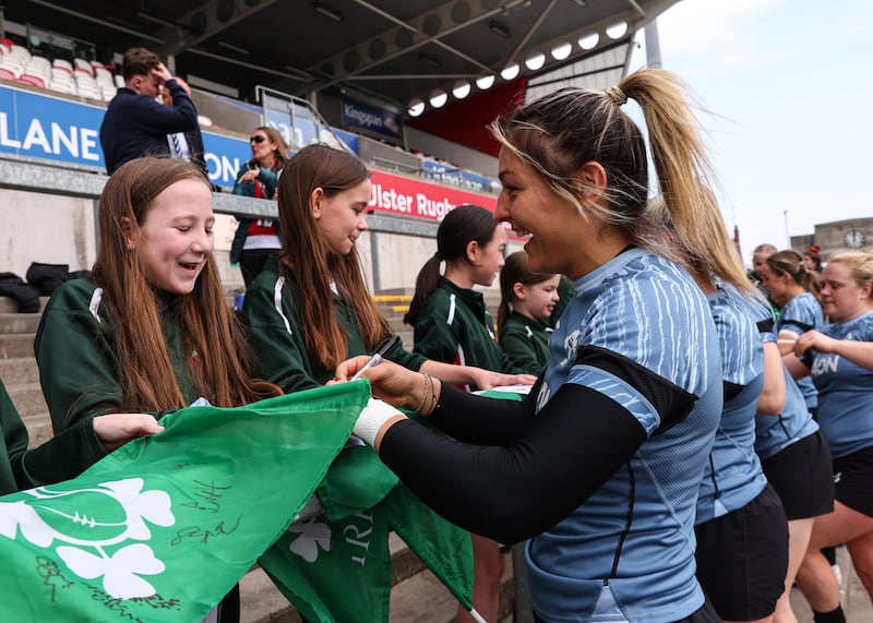 Erin King signs autographs for students from Seaview Primary School and Dundonald Primary School. Photograph: Ben Brady/Inpho