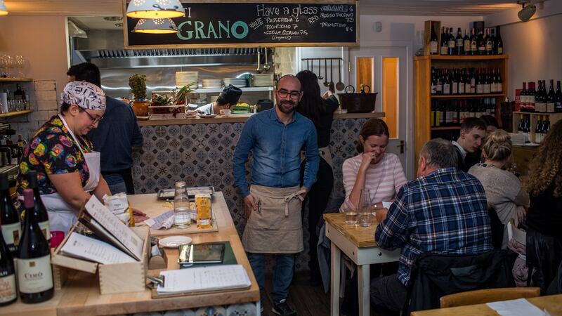 Robert Mungo (centre) tends to guests at Grano in Stoneybatter, Dublin 7.  Photograph: James Forde