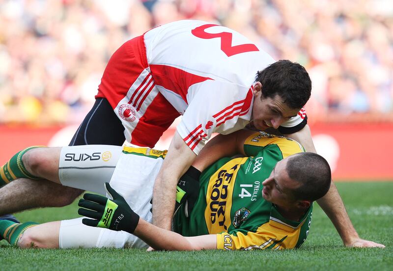 Kerry's Kieran Donaghy with Justin McMahon of Tyrone in the 2008 All-Ireland Senior Football Championship final. Photograph: Cathal Noonan/Inpho