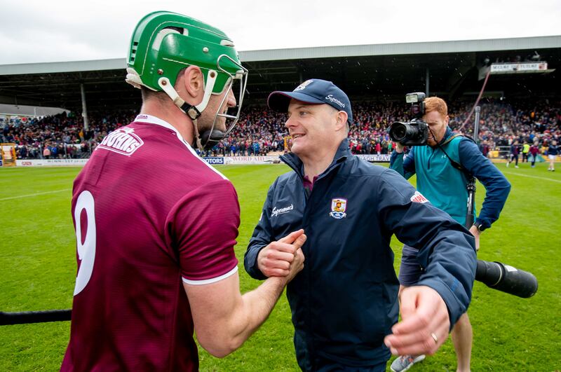 Micheál Donoghue congratulates David Burke after Galway beat Kilkenny at Nowlan Park in the 2019 Leinster championship. Photograph: Morgan Treacy/Inpho