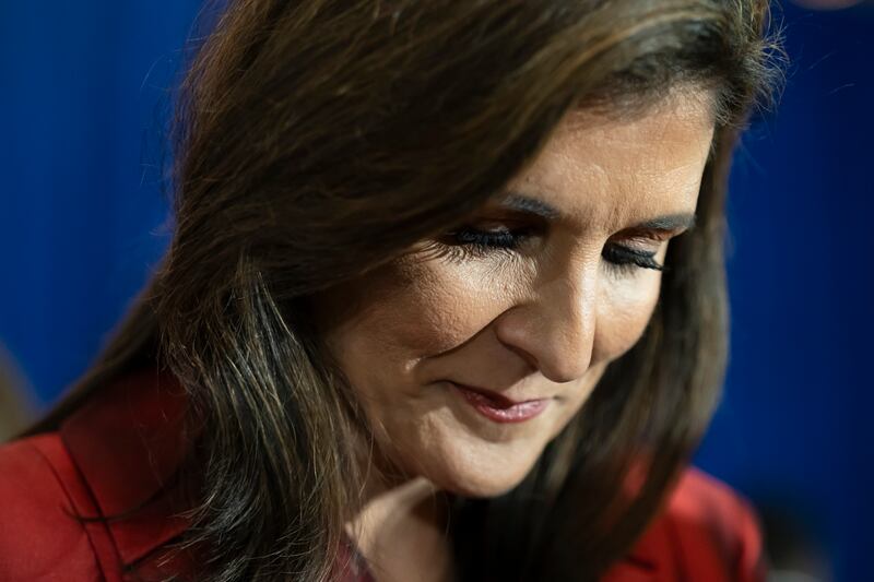 Nikki Haley, the former South Carolina governor and Republican presidential candidate, takes the stage at her election night watch party in Charleston, South Carolina, on Saturday night, after Donald Trump's victory was clear. Photograph: Nicole Craine/The New York Times
                      