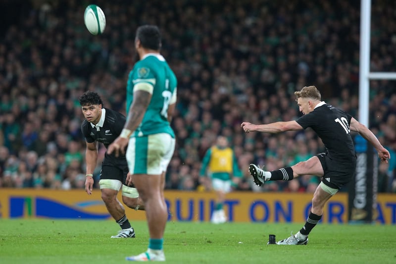 New Zealand's outhalf Damian McKenzie kicks a penalty. Photograph: Paul Faith/AFP via Getty