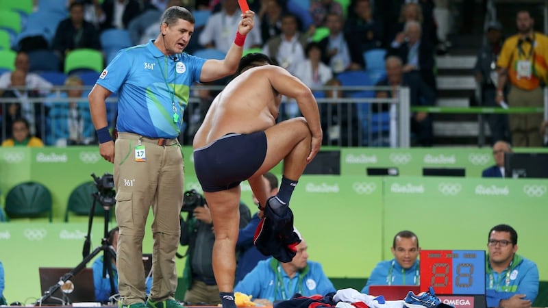 Mongolia’s coaches protest the judges decision after Mandakhnaran Ganzorig is defeated by Ikhtiyor Navruzov of Uzbekistan in the Men’s Freestyle 65kg Bronze match. Photograph: Reuters