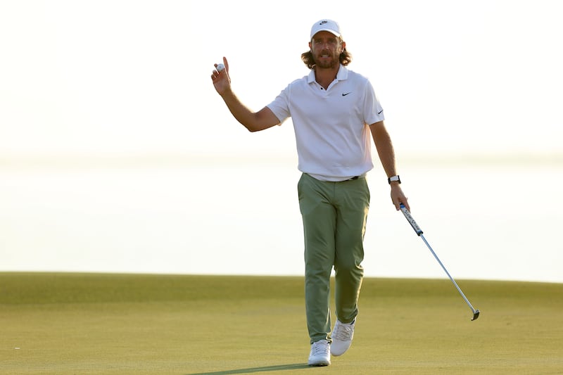 Tommy Fleetwood of England acknowledges the crowd on the 18th green after carding a course record equalling 62 in the first round of the Abu Dhabi HSBC Championship at Yas Links. Photograph: Andrew Redington/Getty Images