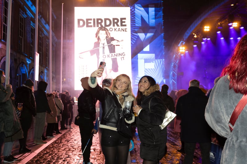 Attendees take a selfie during the NYF Dublin concert at Dublin Castle. Photograph: Allen Kiely