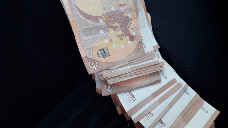 Some of the €12,600 in cash that was seized during searches of four properties in Listowel, Co Kerry.