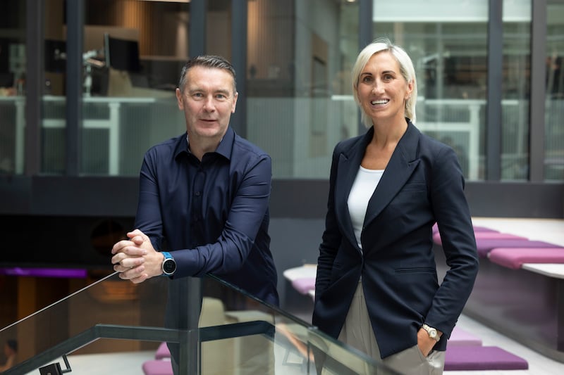 AIB managing director retail banking, Geraldine Casey and Oisín McConville, who won the GAA All Ireland Football Championship with Armagh,  launch AIB’s voluntary gambling block to support customers. Photograph: Shane O'Neill/Coalesce