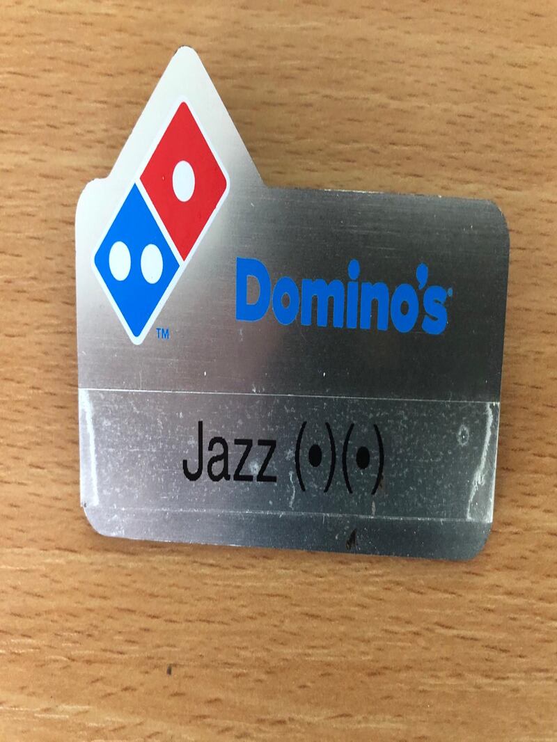 The badge given to Jasmine Olaru by a manager of the Domino's.