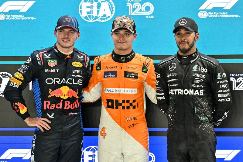 Lando Norris (centre) is P1 for Sunday's race, with Max Verstappen (left) and Lewis Hamilton (right) starting from second and third respectively. Photograph: Mohd Rasfan/AFP via Getty Images