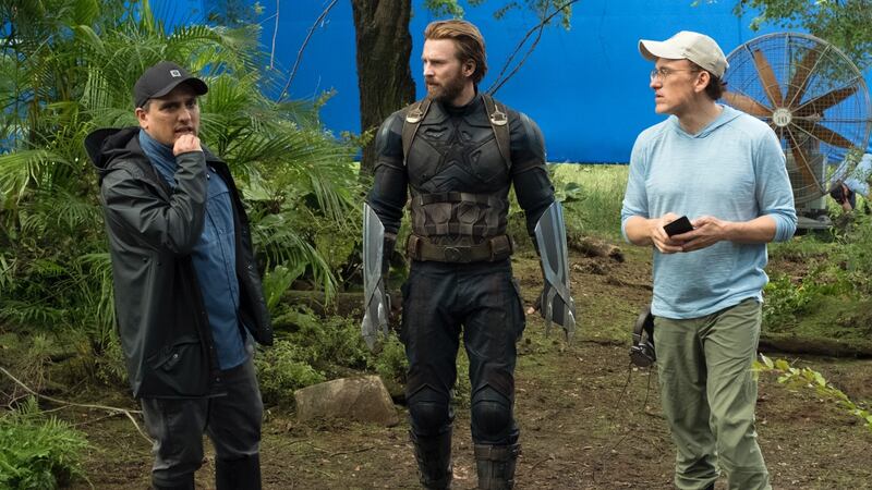 Avengers: Infinity War directors the Russo brothers with Captain America actor Chris Evans during filming. Photograph: Marvel Studios