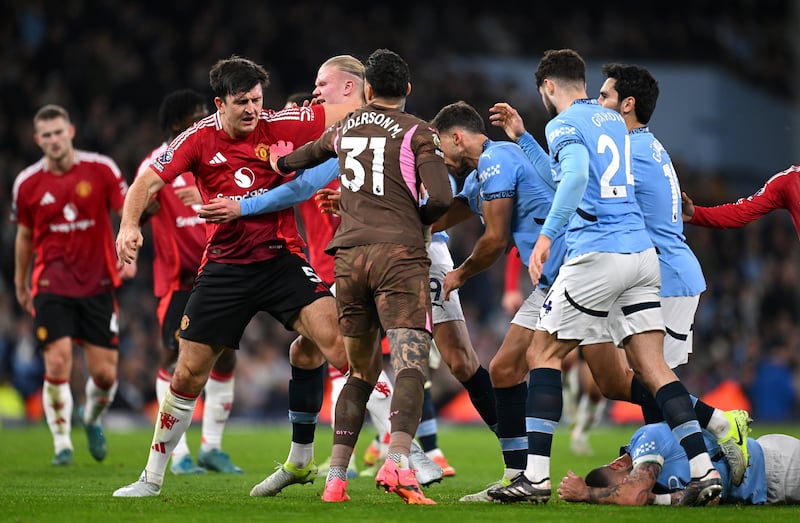 A prostrate Kyle Walker, hiding his face out of embarrassment, maybe. Photograph: Michael Regan/Getty Images