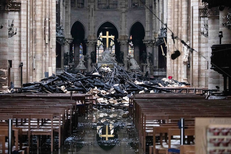 Fallen debris from the burnt-out roof structure sits near the altar inside Notre Dame cathedral on April 16th, 2019.  Photograph: Christophe Morin/Bloomberg via Getty Images