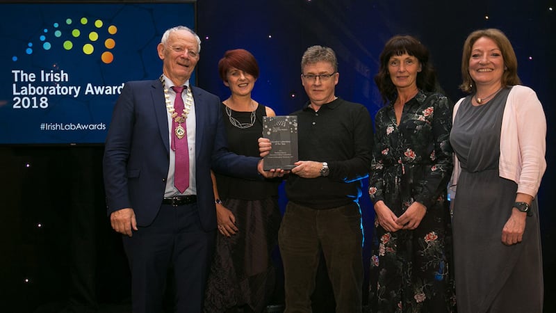 Conor O’Brien, President, Irish Science Teachers Association, presents the Education Laboratory of the Year award to School of Biological Sciences, DIT team.