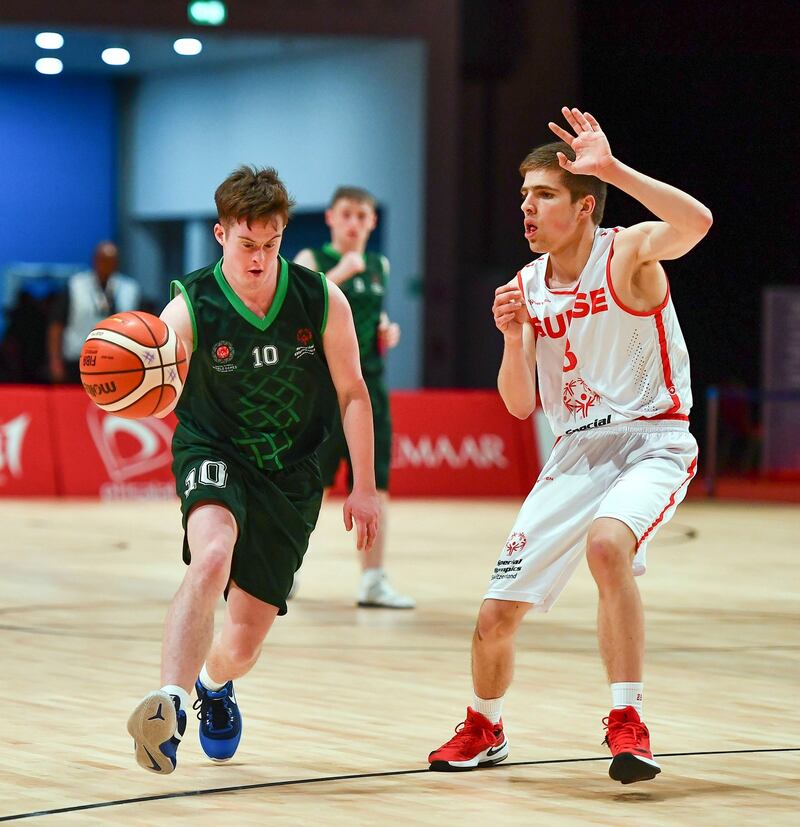 Team Ireland’s Stephen Murphy in action against Emile Terrettaz of Switzerland during the male/mixed play-off round 1 basketball game. Photograph: Ray McManus/Sportsfile