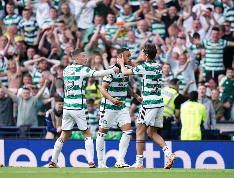 Celtic’s Adam Idah (centre) celebrates with Celtic's Callum McGregor (left) and Celtic’s Matt O'Riley (right) after scoring their side's first goal of the game during the Scottish Gas Scottish Cup final at Hampden Park, Glasgow. Picture date: Saturday May 25, 2024. PA Photo. See PA story SOCCER Scottish Cup. Photo credit should read: Jane Barlow/PA Wire.

RESTRICTIONS: Use subject to restrictions. Editorial use only, no commercial use without prior consent from rights holder.