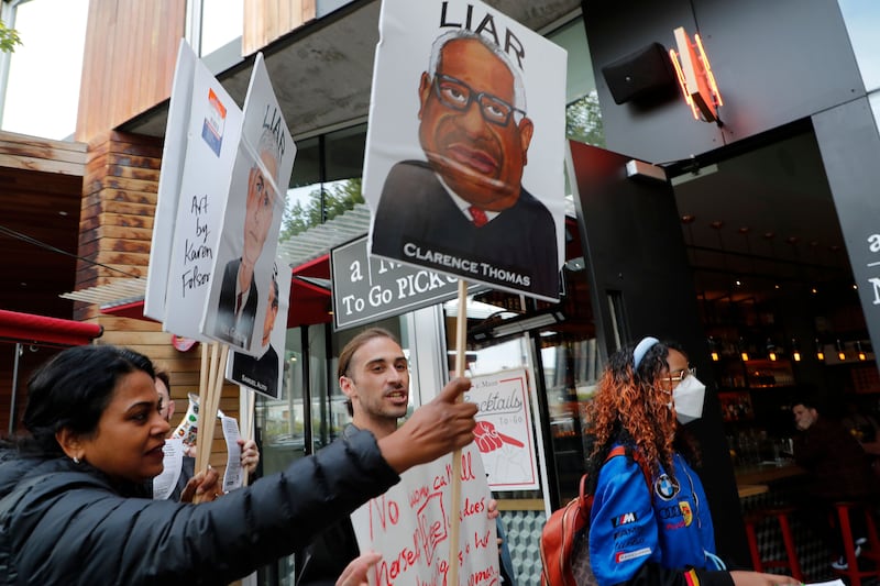 Abortion rights activists march along cafes and restaurants in the Hayes Valley district in San Francisco, California on June 30th. Photograph: John G Mabanglo/EPA 