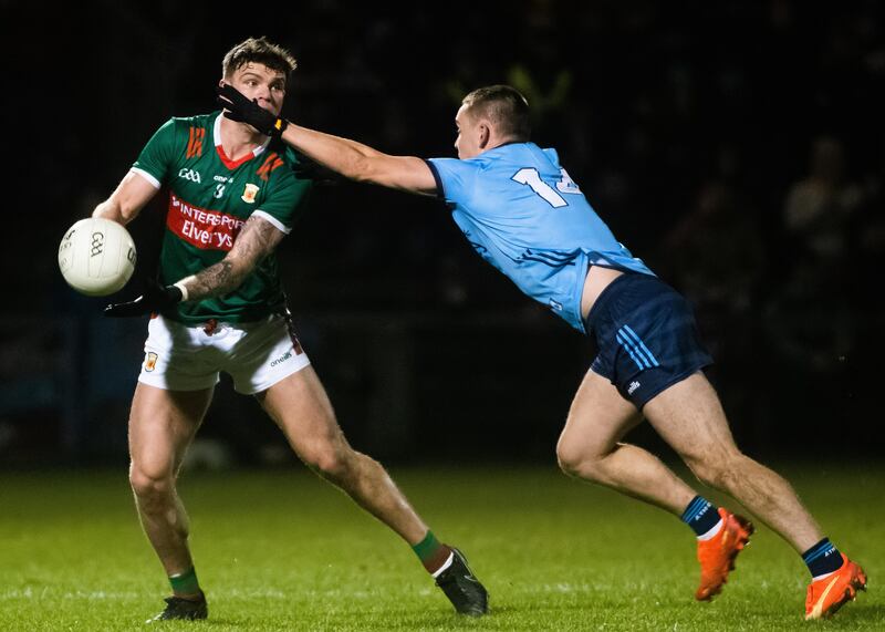 Mayo's Jordan Flynn and Dublin's Con O'Callaghan. Photograph: Evan Logan/Inpho
  