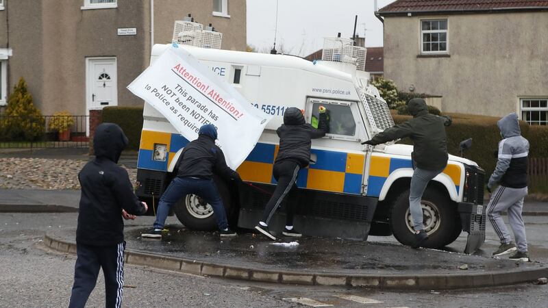 Youths attack PSNI vehicles as they try to prevent members of Derry 1916 Commemoration Committee from taking part in an unregistered parade in the the Creggan area of Derry, Northern Ireland. Photograph: Niall Carson/PA Wire