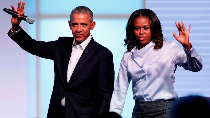 Former US president Barack Obama and his wife Michelle. File photograph:  Jim Young / AFP