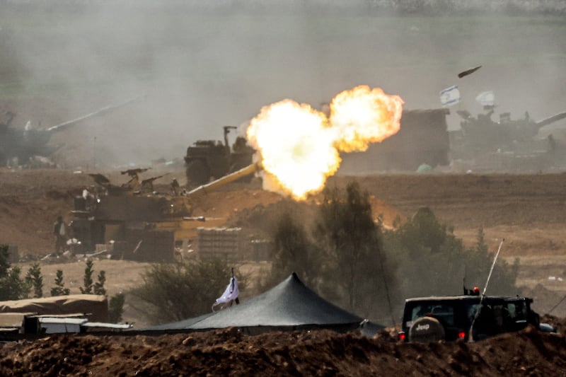 An Israeli army self-propelled howitzer fires rounds near the border with Gaza, in southern Israel. Photograph: Jack Guez/AFP via Getty Images