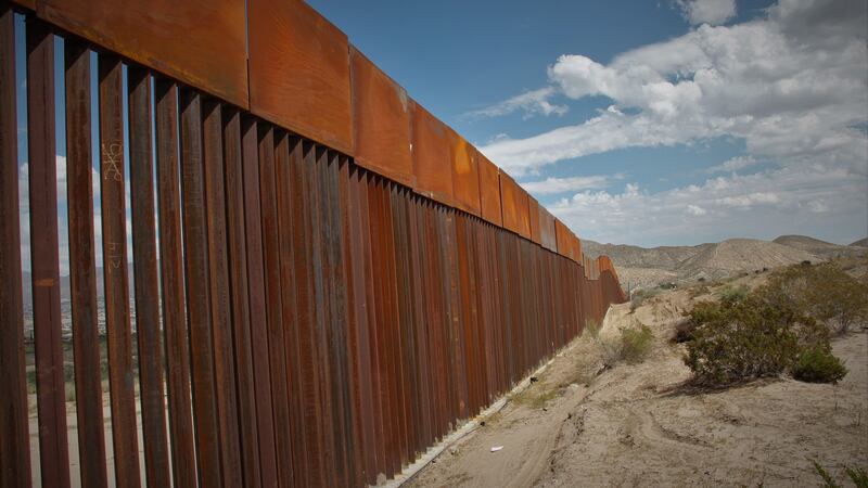 The recently built 6m-high fence at Puerto de Anapra is imposing, but at 2.5km long is just a tiny barrier along the US-Mexican border. Photograph: Stephen Starr