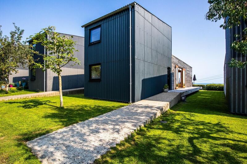 Cedar-clad exterior with bedroom built on top