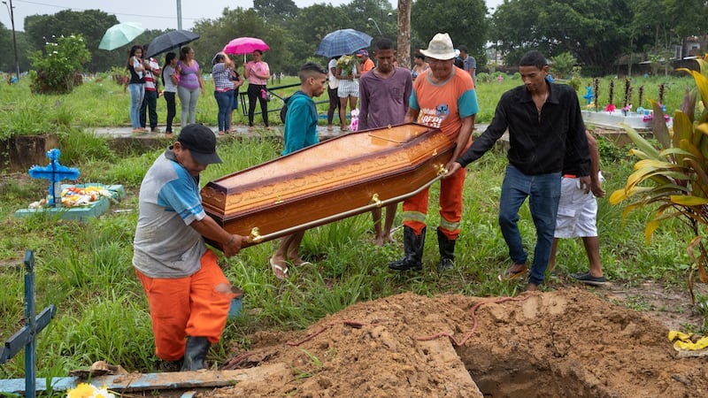 The burial of Vinicius Santos Lobo (18) who was killed by an unidentified man in Belém. Photograph: Tyler Hicks/The New York Times