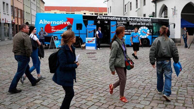 Alternative für Deutschland: the slogans on the party’s election bus reflect its catch-all ambitions. Photograph: Odd Andersen/AFP/Getty