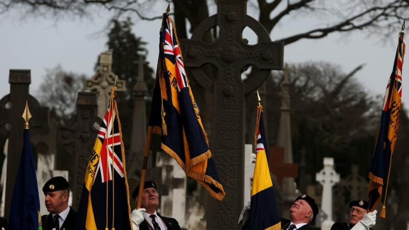 Flag-bearers at a foundation stone-laying ceremony for a Cross of Sacrifice at Glasnevin Cemetery. It commemorates the Irish who fell in the first World War. Photograph: Brian Lawless