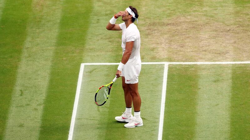 Rafael Nadal reacts during his semi-final defeat to  Novak Djokovic at Wimbledon. John Walton/EPA