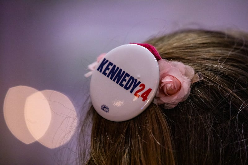 An attendee wearing a hair accessory in support of Robert F Kennedy jnr during a voter rally a in Grand Rapids, Michigan. Photograph: Emily Elconin/Getty Images