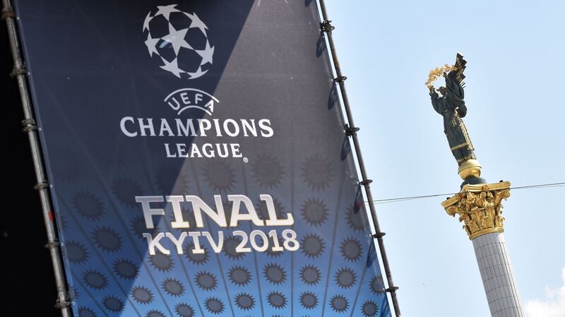 A placard bearing the logo of the Uefa Champions League Cup final is displayed at the fan zone in Kiev. Photograph: Sergei Supinsky/AFP/Getty Images