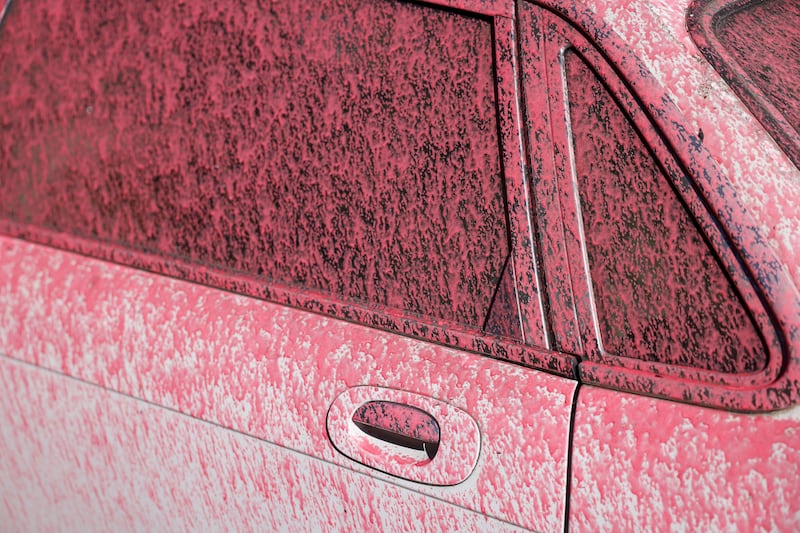 A car is covered in fire retardant in the Pacific Palisades neighbourhood in Los Angeles. Photograph: EPA