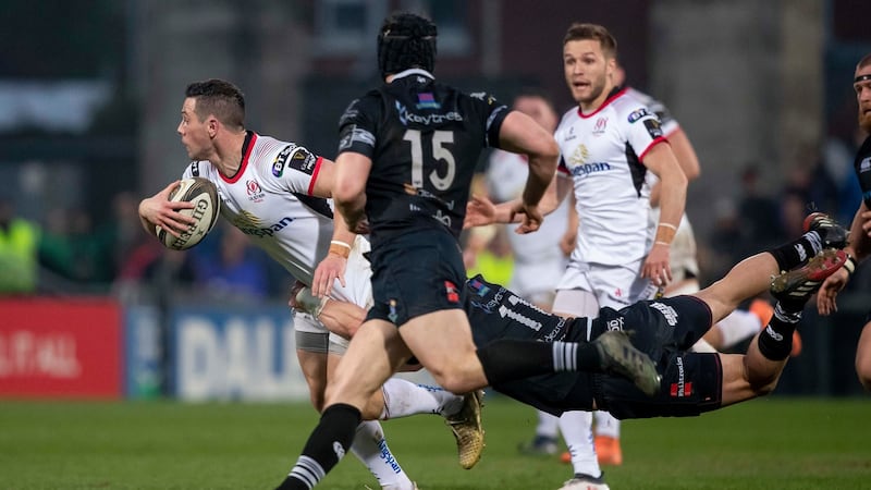 John Cooney is tackled by Hanno Dirksen. Photo: Morgan Treacy/Inpho