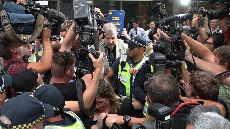 Cardinal George Pell (C) leaves the County Court in Melbourne, Australia. Photograph: EPA