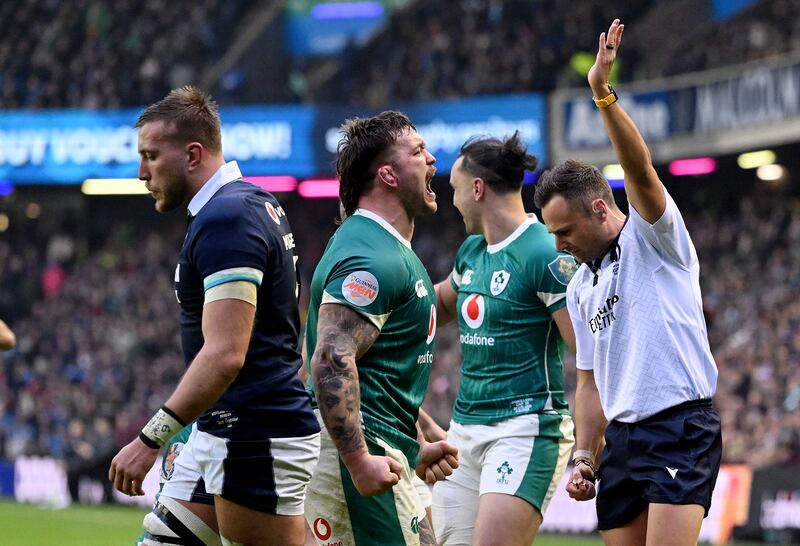 Andrew Porter celebrates after Caelan Doris scored Ireland's second try. Photograph: Stu Forster/Getty Images