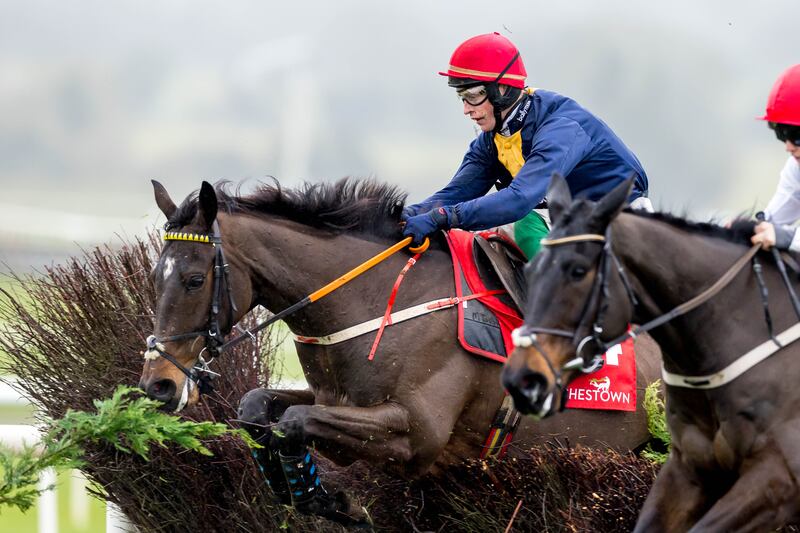 JJ Levin on Fastorslow clears a fence on the way to winning the John Durkan Memorial Steeplechase at Punchestown. Photograph: Morgan Treacy/Inpho 