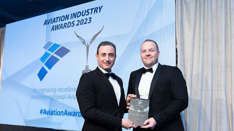 Dr Kyriakos Kourousis, awards judge, presents the aviation innovation award to David Curran, ReGen