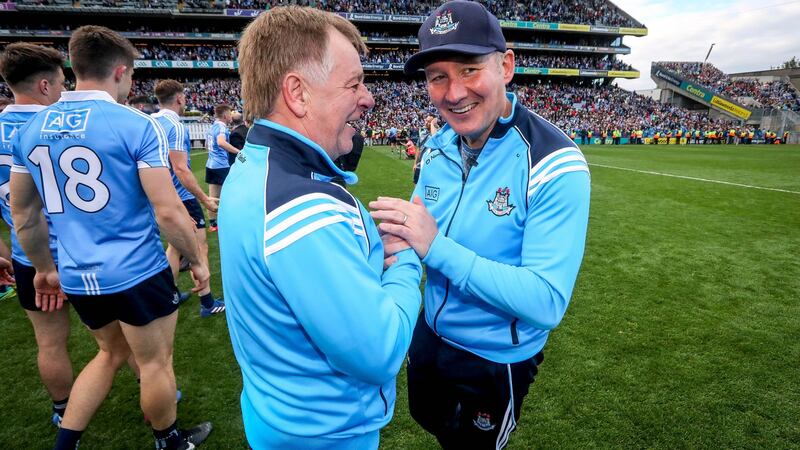 Gavin celebrates with Mick Seavers, Dublin county board vice-chairman, after the 2017 final. Photo: Ryan ByrneInpho