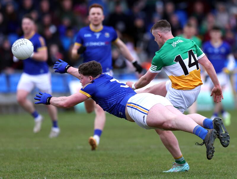 Offaly's Nigel Dunne in action against Longford's Andrew Farrell during the championship victory at Glennon Brothers Pearse Park. Photograph: John McVitty/Inpho