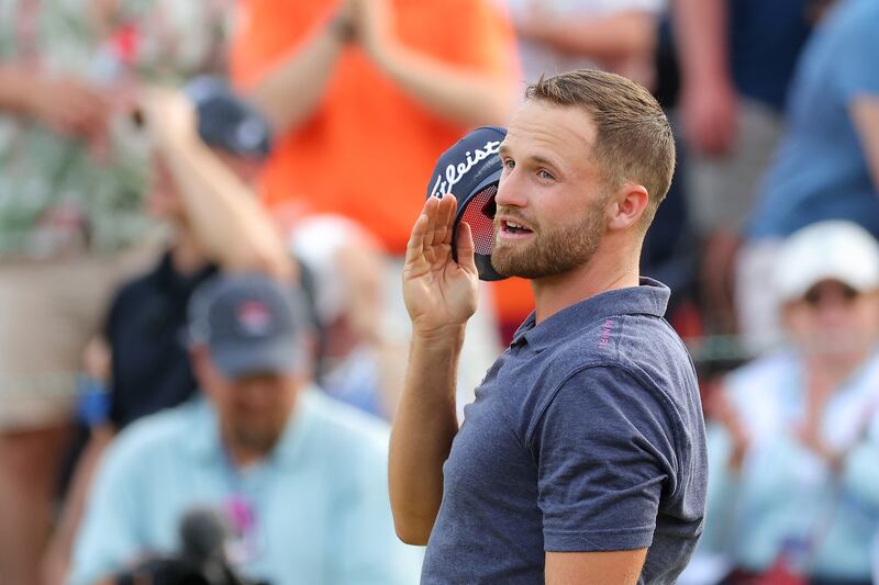 Wyndham Clark of the United States celebrates on the 18th green after winning the Wells Fargo Championship at Quail Hollow Country Club in Charlotte, North Carolina. Photograph: Kevin C. Cox/Getty Images