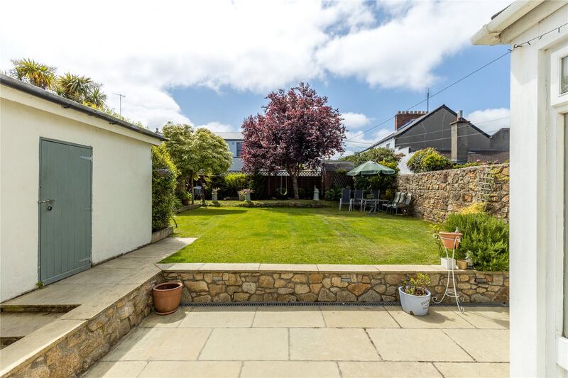 The property has a long garden facing southwest with access to Meath Place