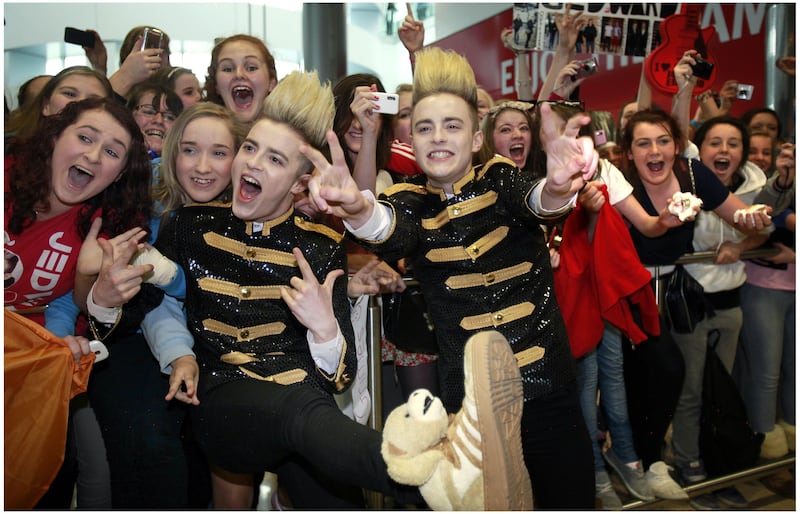 Jedward with fans in 2011. 