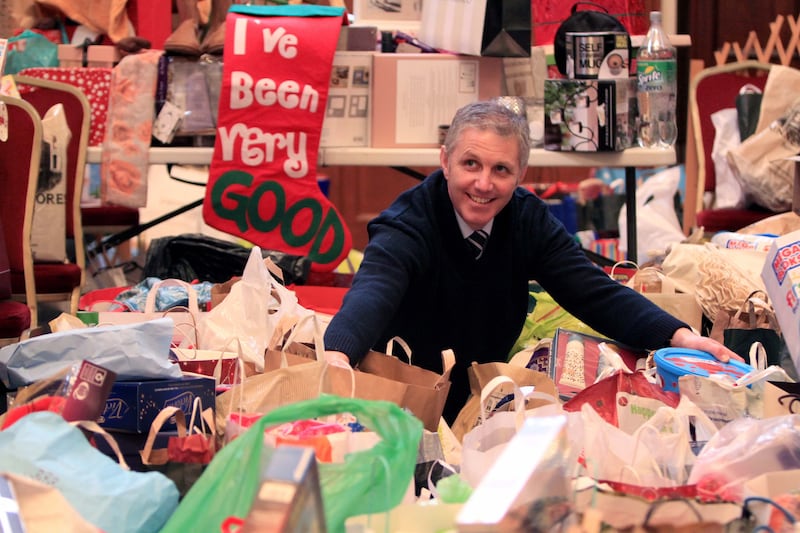 Fiachra Morrison at St Mary's Pro Cathedral, Dublin, with donations of unwanted Christmas presents in January 2015. Photograph: Nick Bradshaw