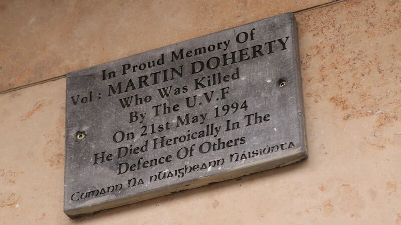 Plaque in memory of Martin Doherty on the property occupying the former site of the Widow Scallans pub. Photograph:  Nick Bradshaw