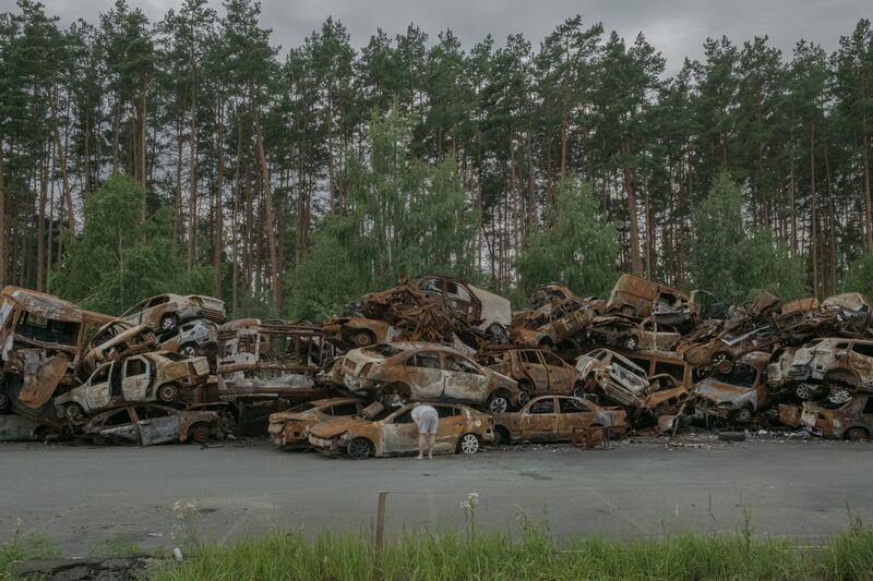 A pile of destroyed vehicles in Irpin, Ukraine. Photograph: Mauricio Lima/New York Times